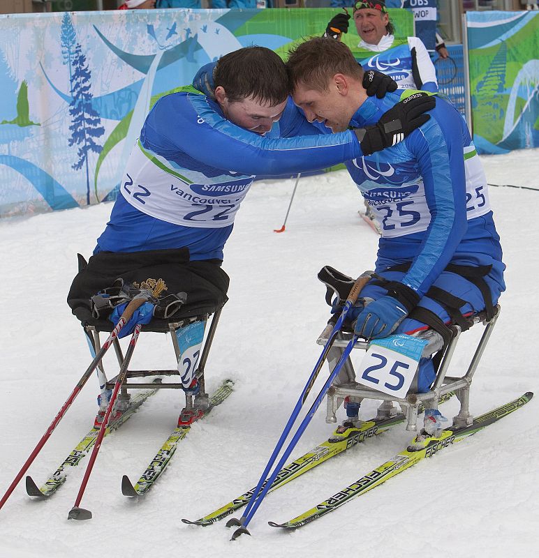 Los rusos Zaripov y Petushkov después de disputar los 15km cross-country.