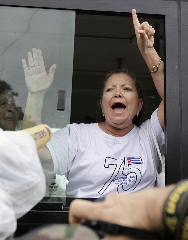 Leader of the Ladies in White shouts from a bus after a march in Havana