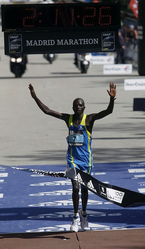 Cherogony of Kenya celebrates as he crosses the finish line of the XXXIII Madrid marathon