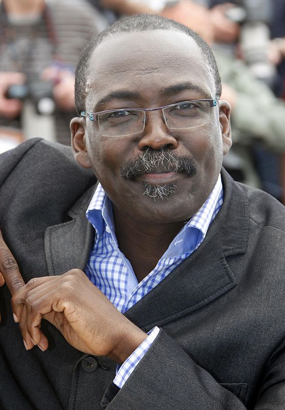 Director Mahamat-Saleh Haroun poses during a photocall for his film "Un homme qui crie" in competition at the 63rd Cannes Film Festival