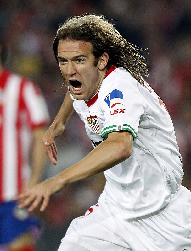 Sevilla's Capel celebrates his goal against Atletico Madrid during their King's Cup final soccer match at Nou Camp stadium in Barcelona