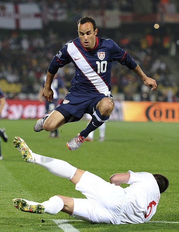 Donovan of the US leaps over England's Terry during their 2010 World Cup Group C soccer match at Royal Bafokeng stadium in Rustenburg