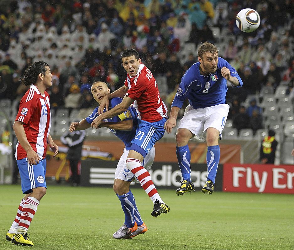 IParaguay's Antolin Alcaraz heads in a goal during their 2010 World Cup Group F soccer match against Italy at Green Point stadium in Cape Town