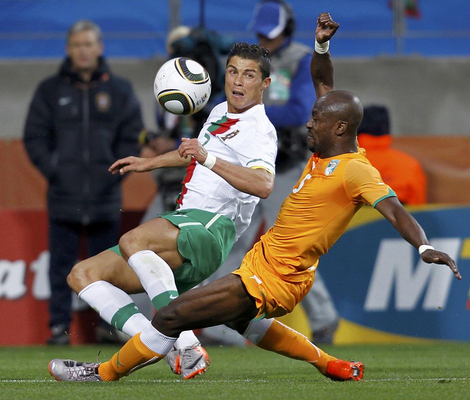 Portugal's Ronaldo battles for the ball with Ivory Coast's Zokora during a 2010 World Cup Group G soccer match in Port Elizabeth