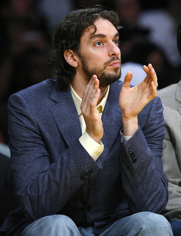 Los Angeles Lakers' Pau Gasol of Spain watches their NBA basketball game against the Houston Rockets from the bench in Los Angeles