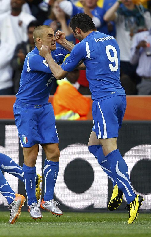 Italy's Iaquinta celebrates with Cannavaro after scoring a goal during their 2010 World Cup Group F soccer match against New Zealand in Nelspruit