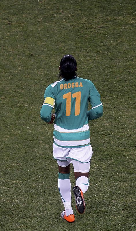 Ivory Coast's Drogba runs on the field at a 2010 World Cup Group G soccer match against Brazil in Johannesburg