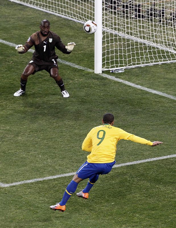 Brazil's Luis Fabiano scores past Ivory Coast's goalkeeper Barry during a 2010 World Cup Group G soccer match at Soccer City stadium in Johannesburg