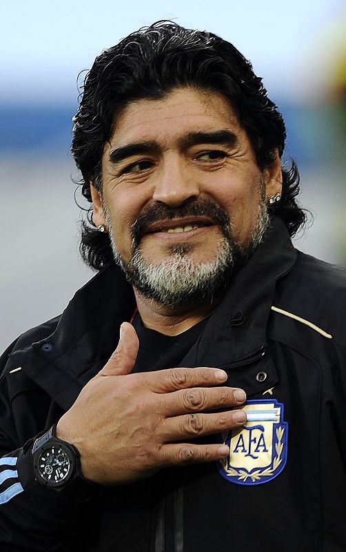 Argentina's coach Diego Maradona smiles before the 2010 World Cup quarter-final soccer match against Germany at Green Point stadium in Cape Town