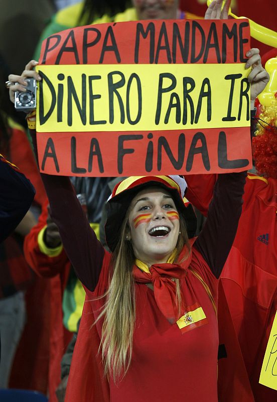 A Spain fan holds up a sign before the 2010 World Cup semi-final soccer match between Germany and Spain at Moses Mabhida stadium in Durban