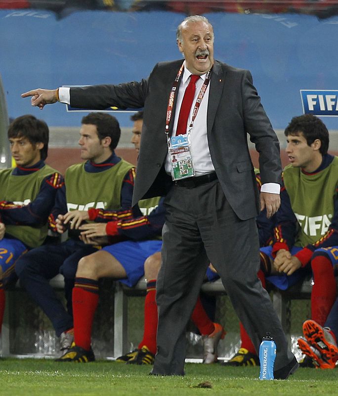 Spain's coach Vicente del Bosque shouts to his players during their 2010 World Cup semi-final soccer match against Germany at Moses Mabhida stadium in Durban