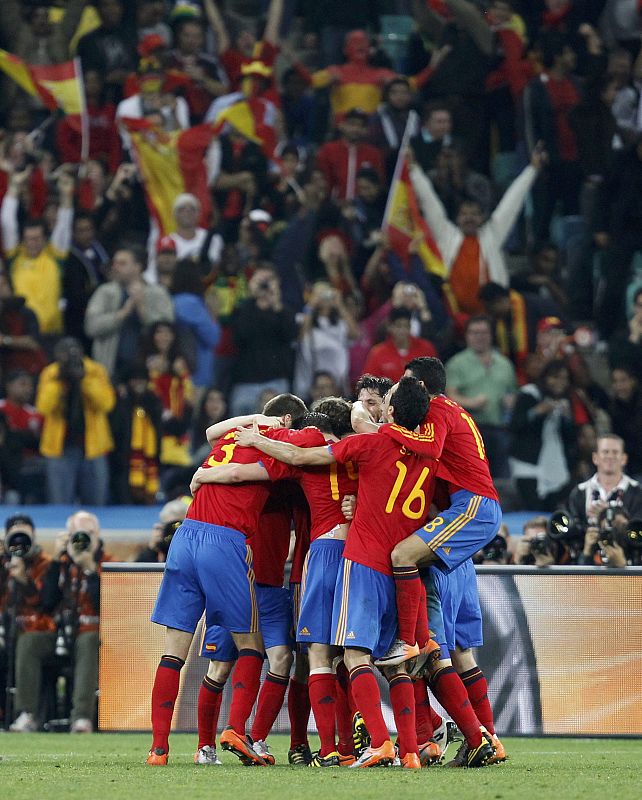 Spain's Puyol celebrates his goal with team mates during the 2010 World Cup semi-final soccer match against Germany at Moses Mabhida stadium in Durban