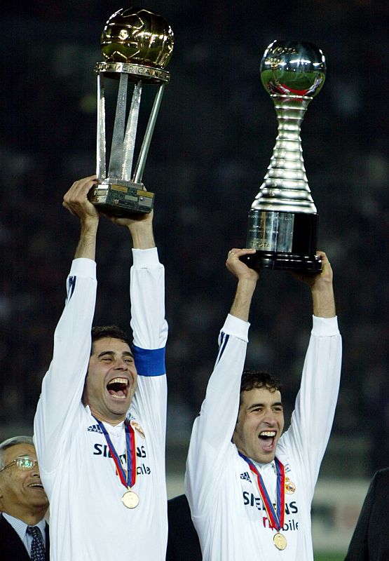 REAL MADRIDS HIERRO AND RAUL CELEBRATE WORLD CLUB CUP WIN IN YOKOHAMA.