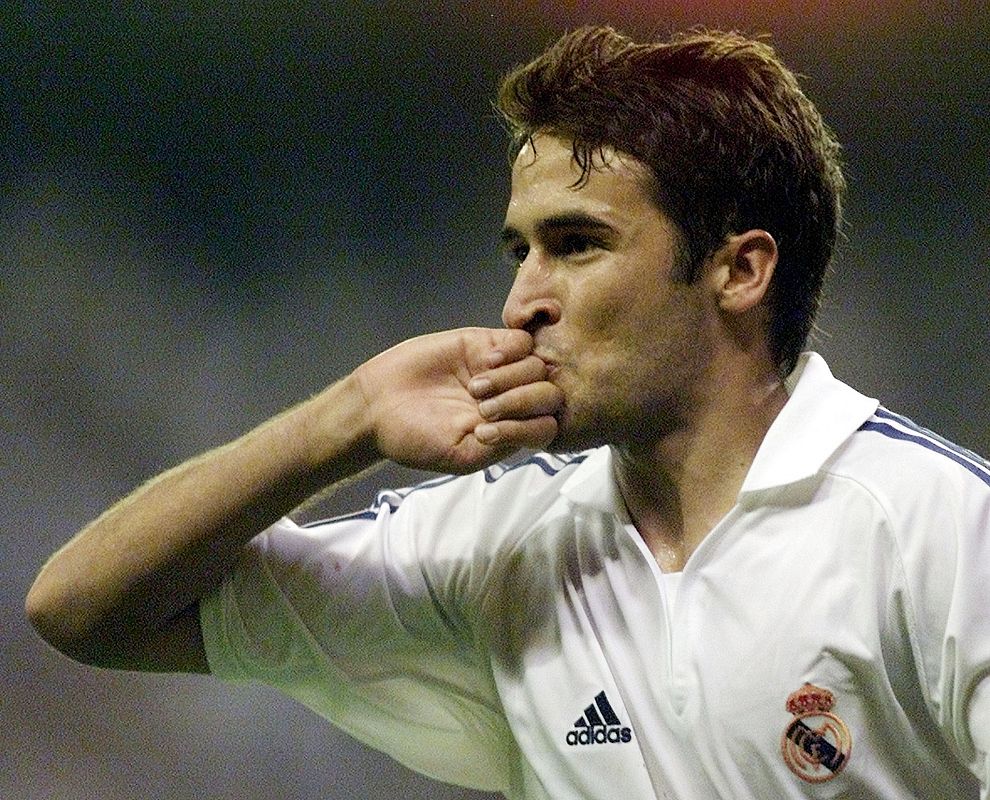 REAL MADRID'S STRIKER RAUL KISSES HIS AFTER SCORING AGAINST ZARAGOZA.