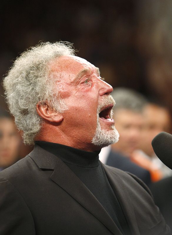 Singer Tom Jones sings "God Save the Queen" prior to Ricky Hatton of Britain fighting Manny Pacquiao of the Phillippines