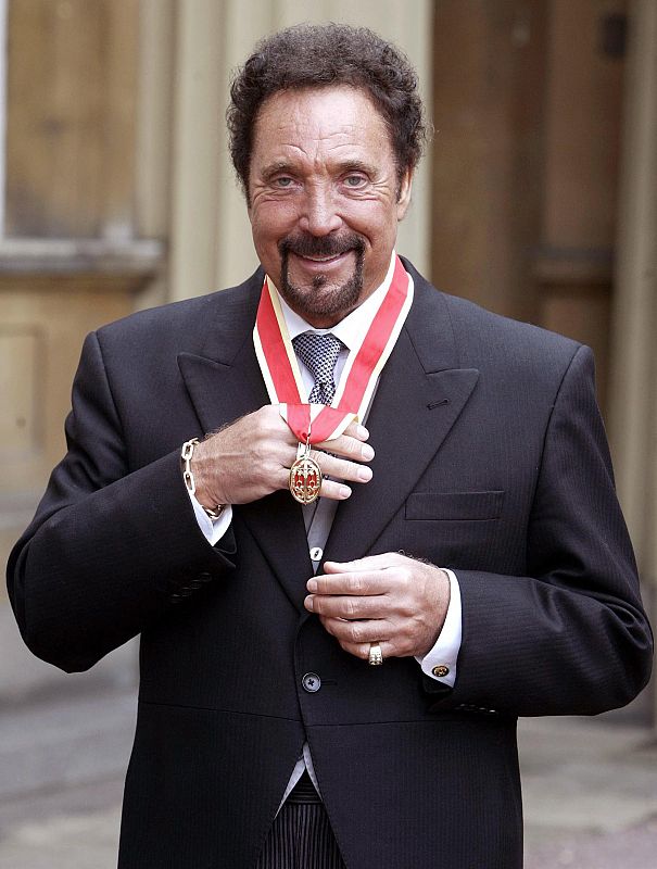 Singer Jones displays knighthood from Britain's Queen Elizabeth II at Buckingham Palace