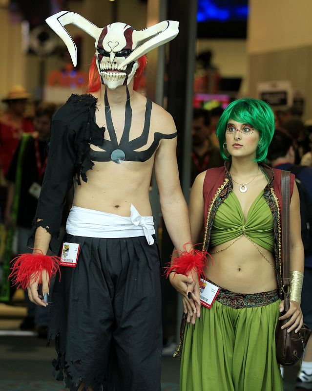 Attendees arrive in costume for the third day of the pop culture convention Comic Con in San Diego