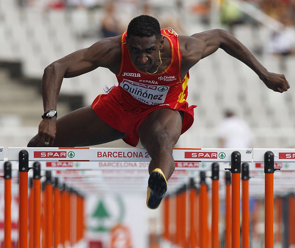 Quinonez of Spain clears a hurdle during the men's 110 metre hurdle heats at the European Athletics Championships in Barcelona