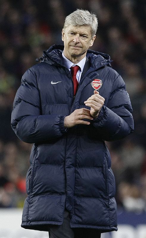 Arsenal's coach Wenger reacts during their Champions League quarter-final soccer match against Barcelona in Barcelona