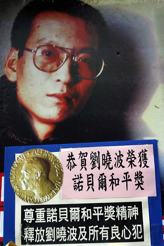 A photo of jailed Chinese dissident Liu Xiaobo is displayed outside the Chinese Foreign Ministry in Hong Kong