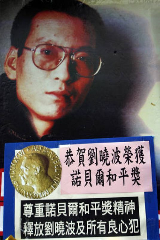 A photo of jailed Chinese dissident Liu Xiaobo is displayed outside the Chinese Foreign Ministry in Hong Kong