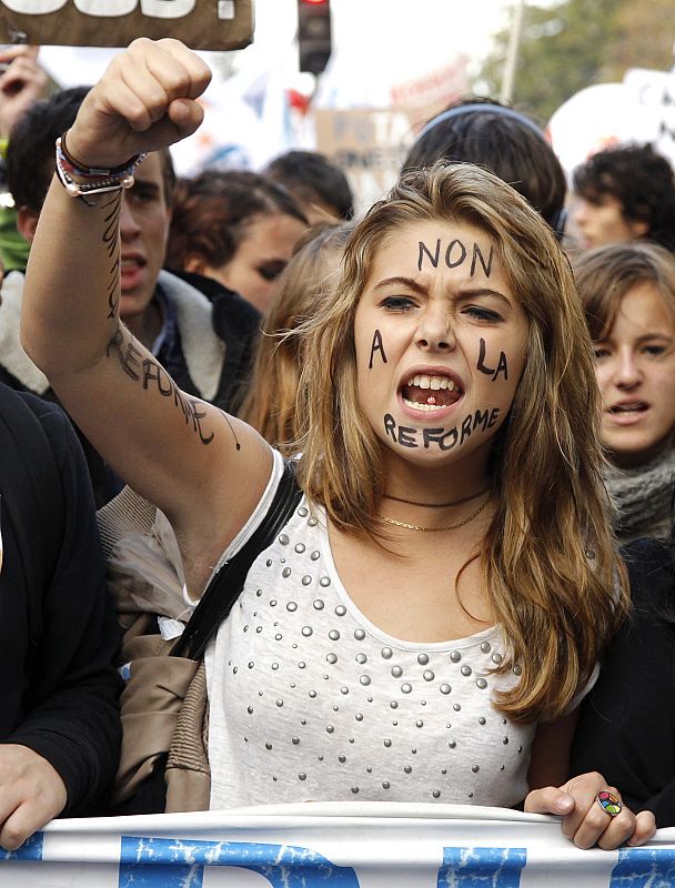 School students attend a demonstration over pension reform in Paris