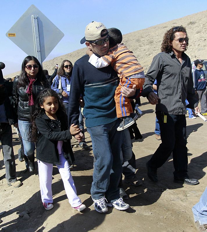 Rescued Chilean miner Alex Vega is seen as he arrives at the San Jose mine after being trapped inside