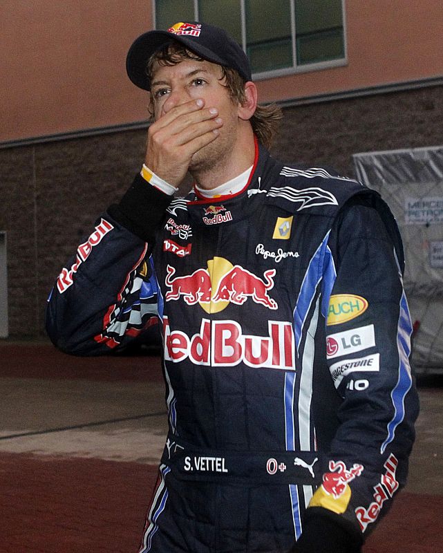 Red Bull Formula One driver Vettel of Germany reacts in the paddock after he retired from the South Korean F1 Grand Prix at the Korea International Circuit in Yeongam