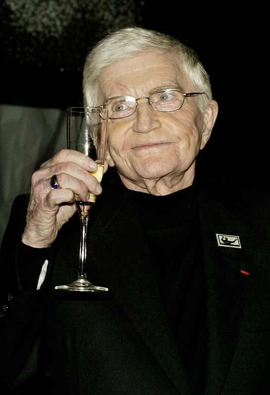 DIRECTOR BLAKE EDWARDS ACCEPTS A TOAST IN HIS HONOR.