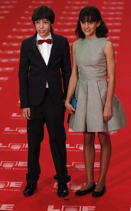 Spanish actor Colomer and actress Comas, nominees for best newcomer award, pose for photographers on red carpet at Madrid's Royal Theatre