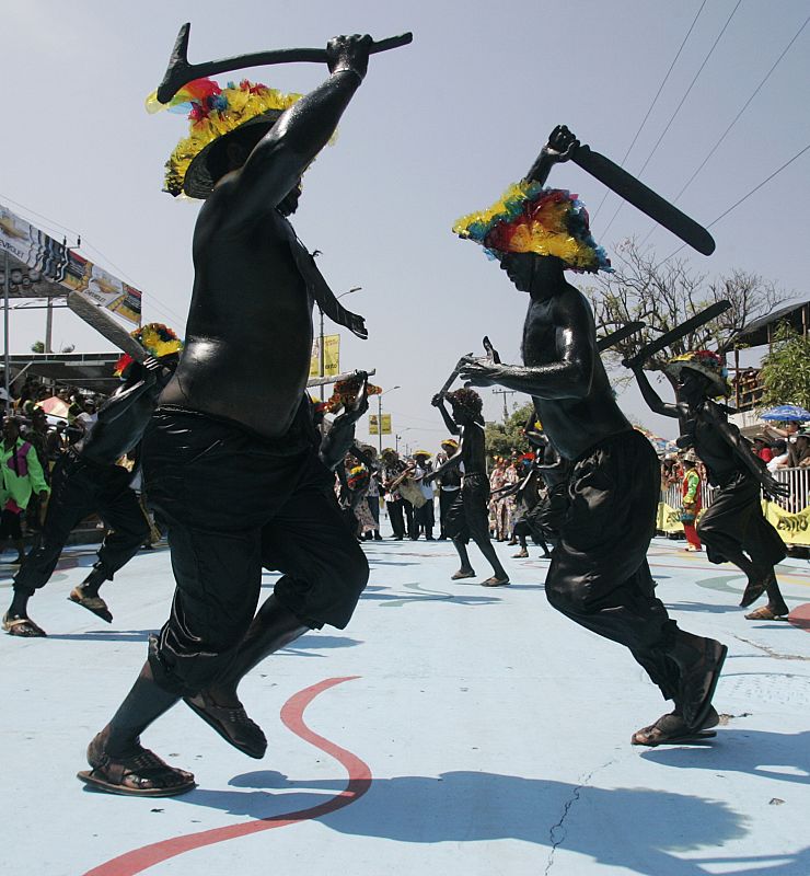 Dancers from the "Son de Negro" group perform during a parade at the Barranquilla's carnival in Colombia