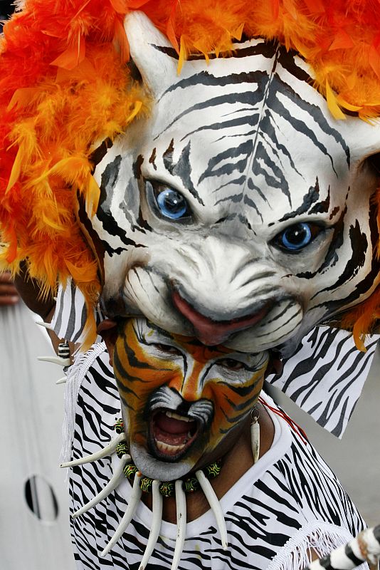 A reveller performs during a parade at the Barranquilla's carnival in Colombia