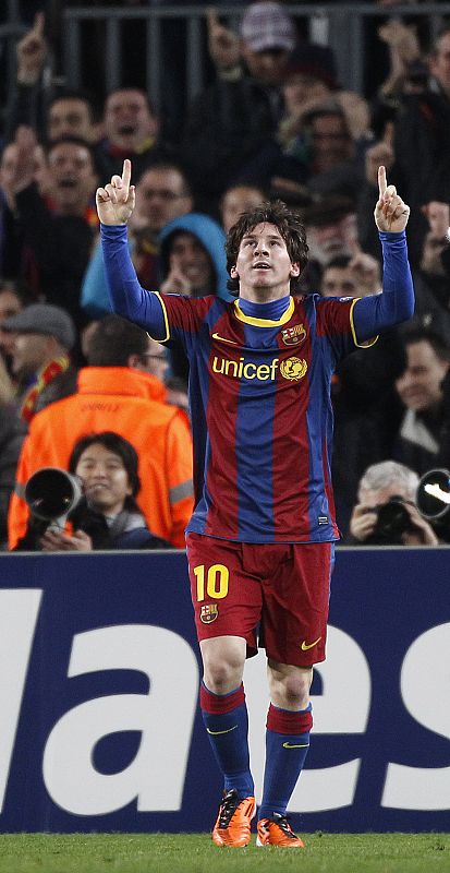 Barcelona's Lionel Messi celebrates scoring a goal against Arsenal during their Champions League soccer match in Barcelona