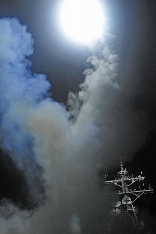 Arleigh Burke-class guided-missile destroyer USS Barry (DDG 52) launches a Tomahawk missile in support of Operation Odyssey Dawn in the Mediterranean Sea