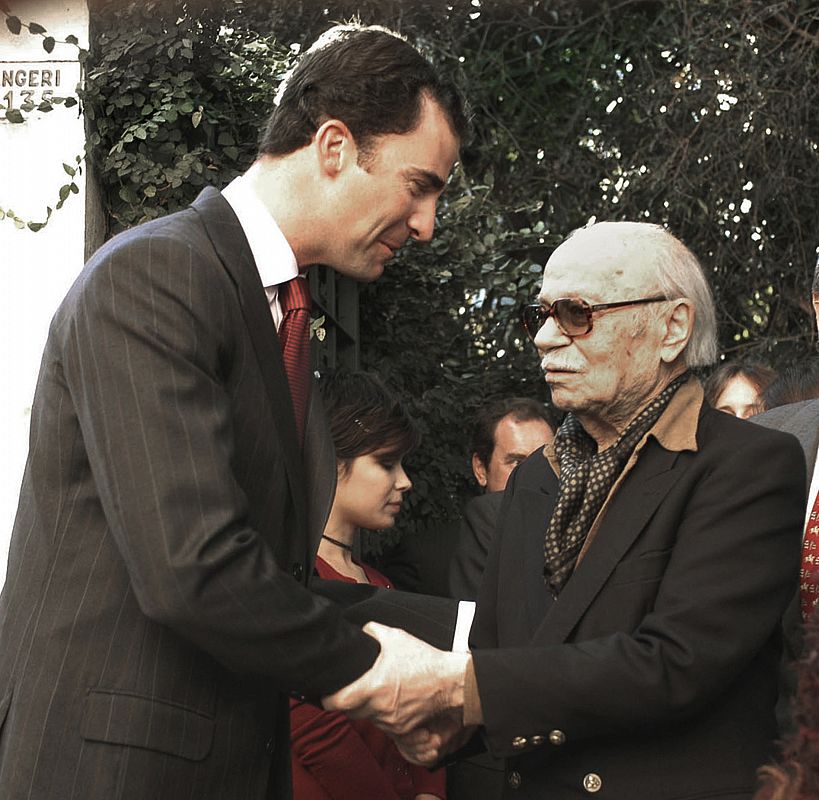 File photo of Spanish Prince Felipe and Argentine author Sabato during a visit to Sabato's home on the outskirts of Buenos Aires