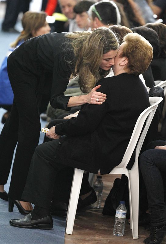 Spain's Princess Letizia embraces a family member of earthquake victims at a funeral ceremony in Lorca