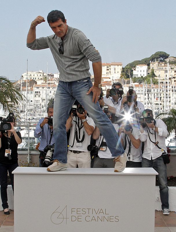 Actor Banderas poses during a photocall for the film "La Piel Que Habito", by director Almodovar in competition at the 64th Cannes Film Festival