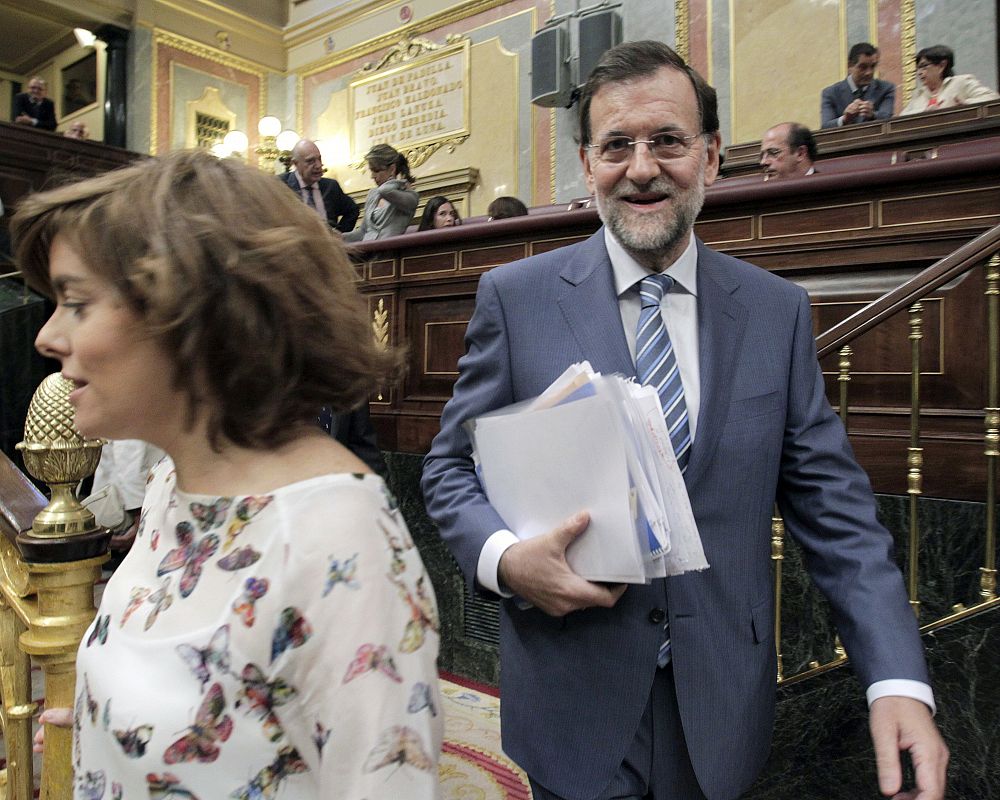 El líder del PP, Mariano Rajoy, a su llegada a la primera jornada del debate sobre el estado de la nación, que comenzó con la intervención del presidente del Gobierno, José Luis Rodríguez Zapatero.
