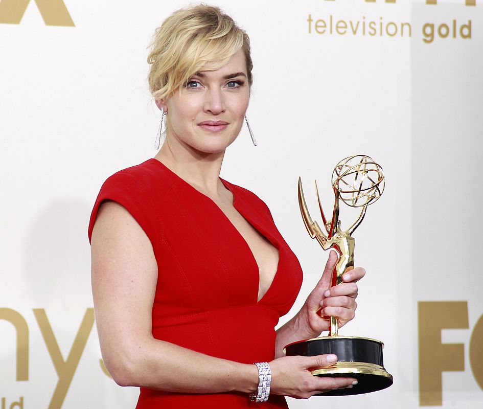 Actress Winslet holds her Emmy award for outstanding lead actress in a miniseries or a movie "Mildred Pierce" at 63rd Primetime Emmy Awards in Los Angeles