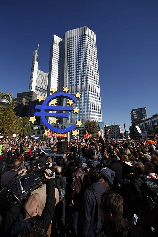 Protesters demonstrate against banking and finance in front the headquarters of the European Central Bank in Frankfurt