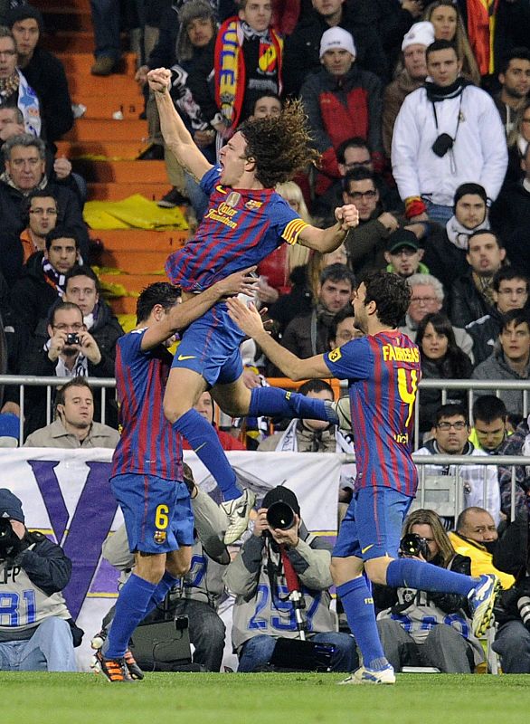 Barcelona's Puyol celebrates after scoring against Real Madrid during their Spanish King's Cup soccer match in Madrid
