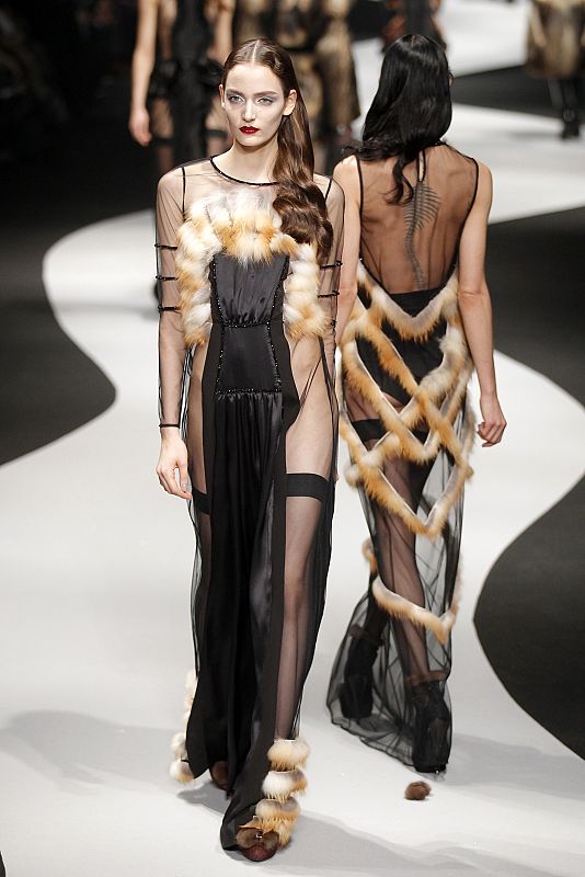 A model presents a creation by Dutch designers Viktor and Rolf as part of their Fall/Winter 2012-2013 women's ready-to-wear fashion show during Paris fashion week