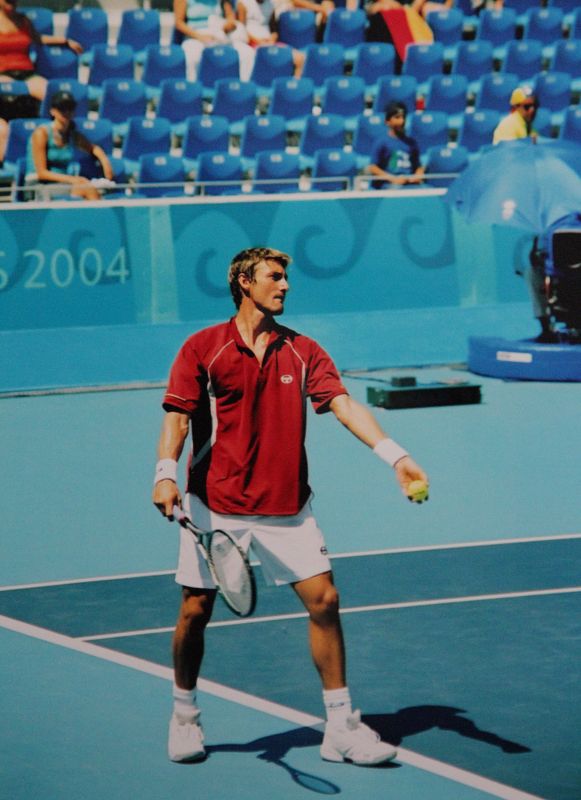 Juan Carlos Ferrero en los JJ.OO. de Atenas 2004. En el partido contra Mardy Fish.