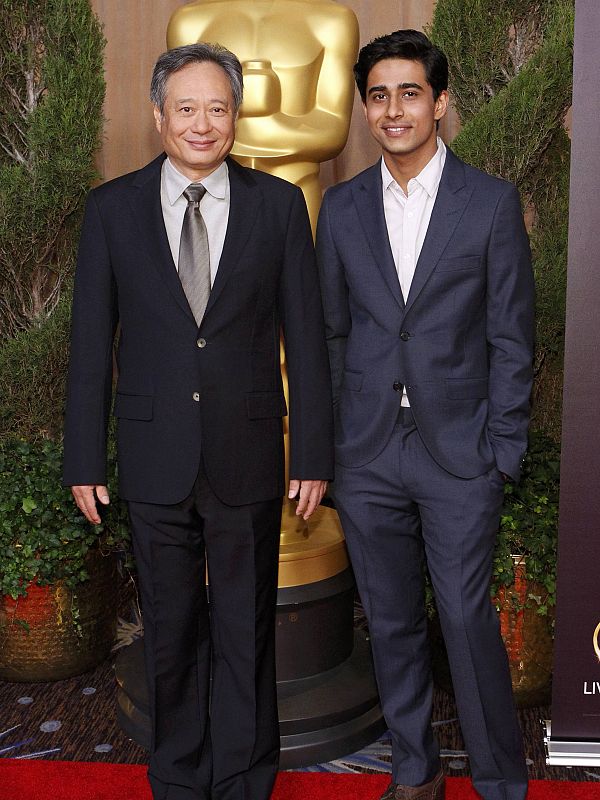 Director Ang Lee and actor Suraj Sharma attend the 85th Academy Awards nominees luncheon in Beverly Hills