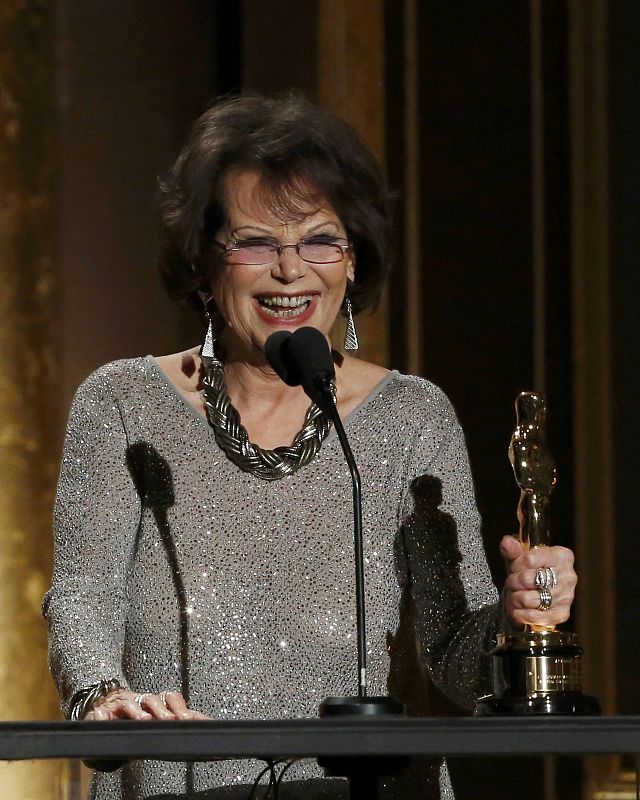 Italian actress Cardinale accepts an Honorary Award on behalf of Italian costume designer Tosi at the Annual Academy of Motion Picture Arts and Sciences Governors Awards in Hollywood