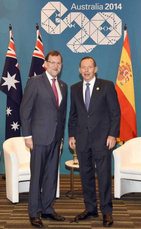 El presidente Mariano Rajoy con el primer ministro australiano Tony Abbott (d) 