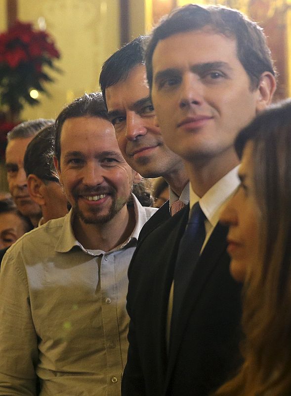 Los candidatos a la Presidencia del Gobierno por Ciudadanos, Albert Rivera; por UPyD, Andrés Herzog; y por Podemos, Pablo Iglesias, en la recepción en el Congreso el 6 de diciembre.