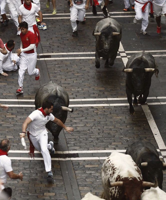 Los mozos corren en Mercaderes