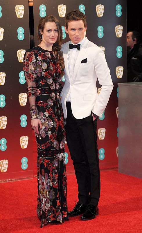 Eddie Redmayne and Hannah Bagshawe arrive for the British Academy of Film and Television  Awards (BAFTA) at the Royal Albert Hall in London