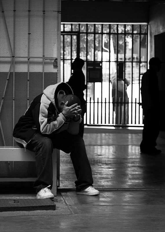 Migrante en la frontera de Tijuana en México